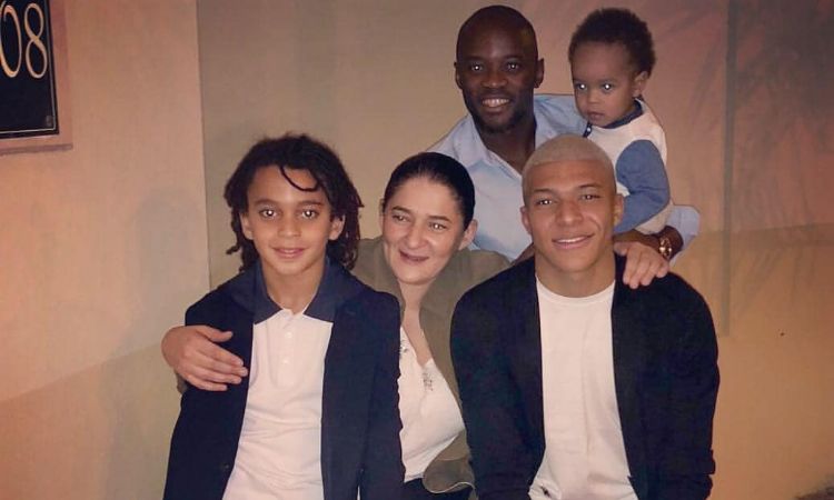 Fayza Lamari with her three sons and grandson. 